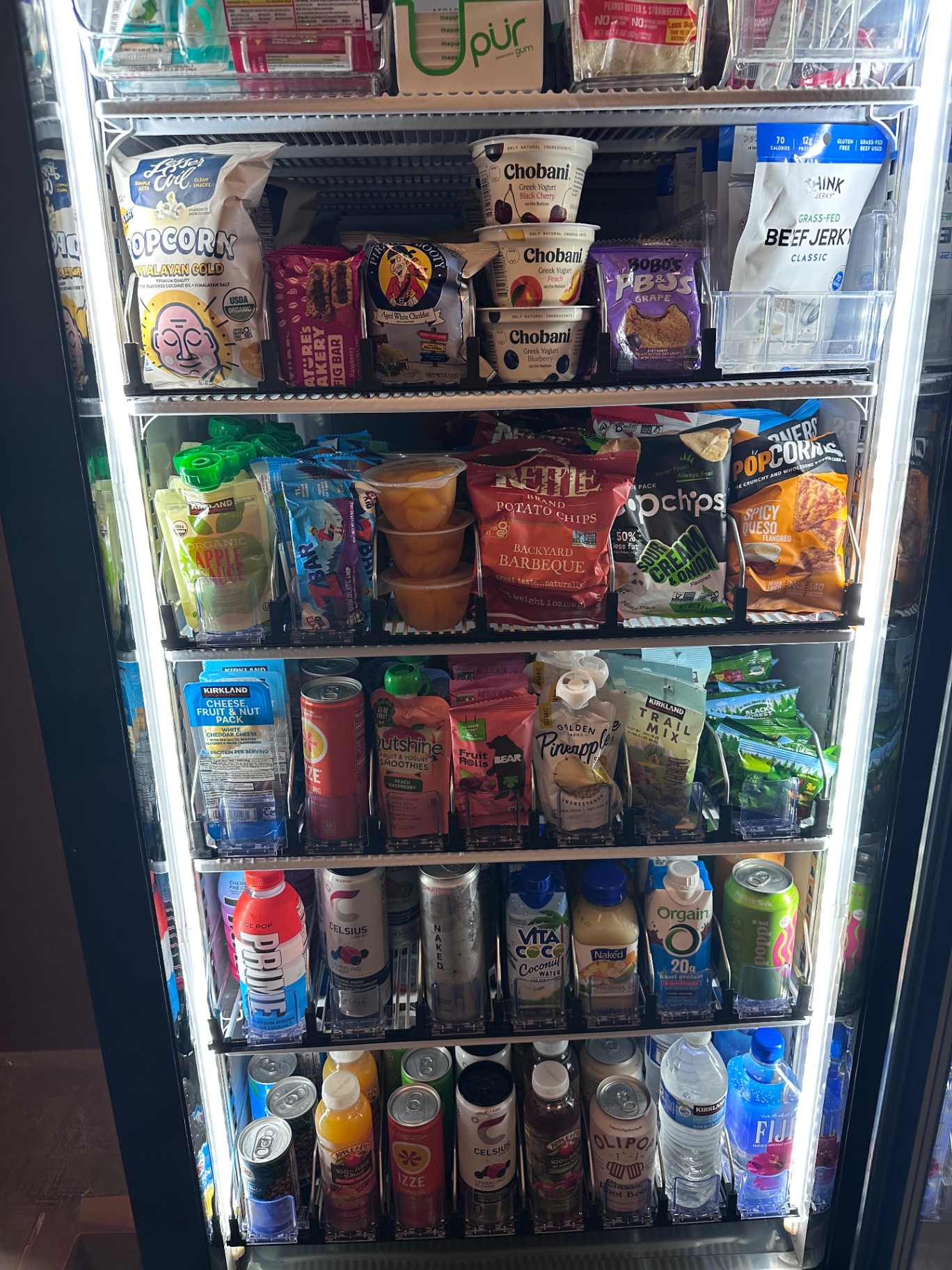 Deliteful Vending cooler stocked with healthy snacks and drinks for a Pasco workplace